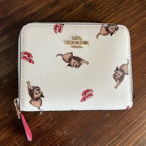 Brand new with tags…COACH small zip wallet printed with WIZARD OF OZ
